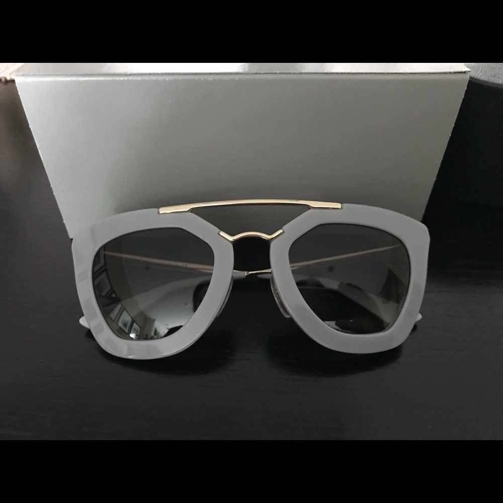 Prada women’s grey aviator sunglasses